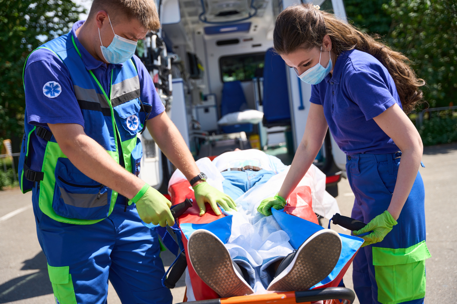 Paramedics laid the patient for transportation on a vacuum mattress